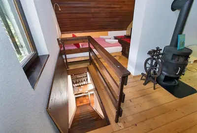an overhead view of a staircase with a stove in a house at Chalet Jasmin in Bohinj