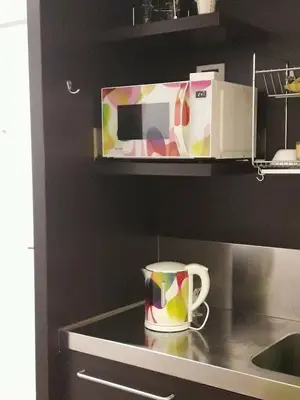 a coffee cup sitting on a counter in a kitchen at Apartma Kurji vrh - Chicken top in Kranjska Gora