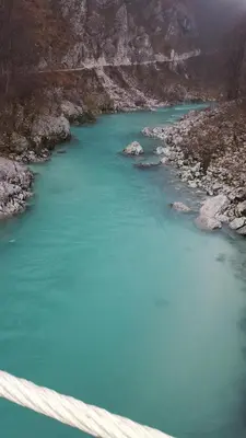 a view of a river with blue water at Počitniška hiša Pologar in Tolmin