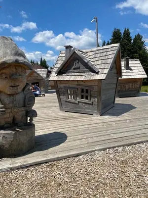 a small wooden house on a wooden deck at Chalet Klara in Resnik