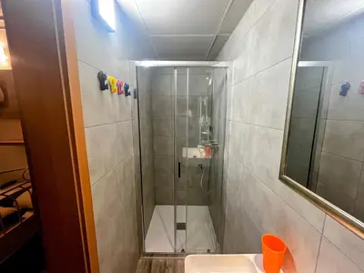 a bathroom with a shower and a sink at Peter rooms in Ljubljana