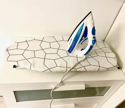 a computer monitor sitting on top of a bed at Apartments Pri nas in Kobarid