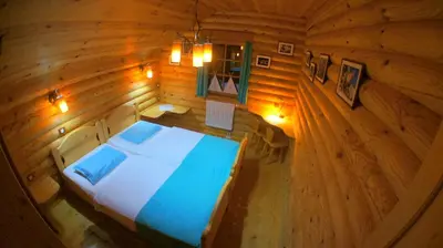 an overhead view of a bedroom in a wooden cabin at Kamp Koren Kobarid in Kobarid