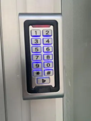 a remote control is attached to a wall at Blue Point Apartment Ljubljana in Ljubljana