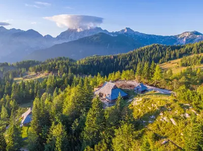 an aerial view of a house in the mountains at Chalet Gorenjka - Velika planina in Stahovica