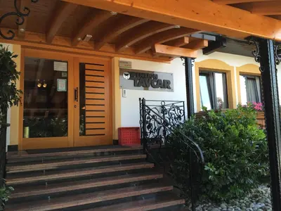 a front door of a building with a porch at Penzion Tavcar in Ljubljana