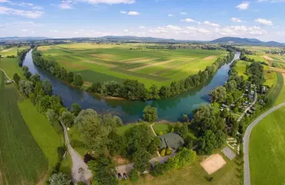 an aerial view of a river with trees and houses at Apartment Countryside Kolpa-Bela krajina in Metlika