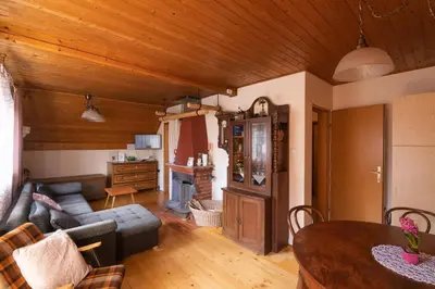 a living room with a couch and a table at House Franja in Kranjska Gora
