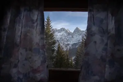 a window with a view of a mountain at House Franja in Kranjska Gora
