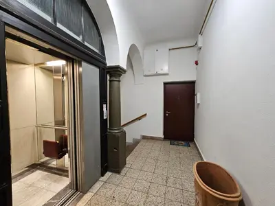 a hallway with a door to a bathroom at Charming apartment Laura Tour As Ljubljana by Town Hall in Ljubljana