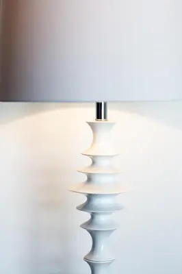 a close up of a white table lamp at Vila Marija in Ljubljana