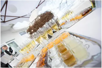 a bunch of glasses with bees in them at Hotel Bellevue in Kranj