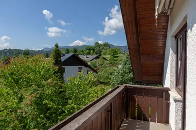 a balcony with a view of the mountains at Vacation Home Sofia in Zgornje Gorje