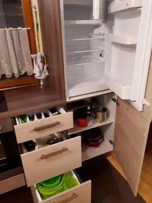 an empty refrigerator with its door open withartments at KRESNIČKA in Čatež ob Savi