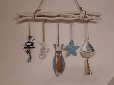 a group of items hanging on a wall at KRESNIČKA in Čatež ob Savi