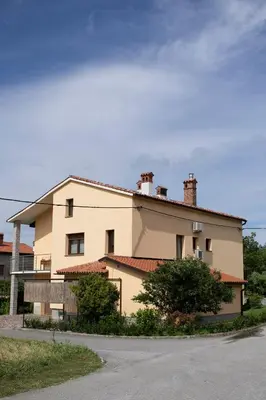 a large white building with red roof at Borea Rooms - Sobe Budanje in Vipava