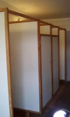 two stalls in a room with two doors at farmglamping Planika - Encijan in Hraše