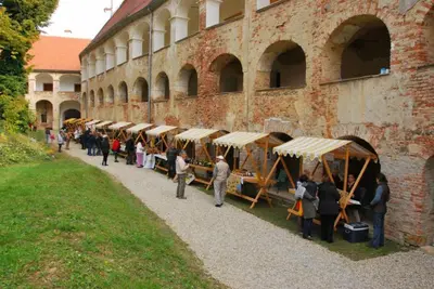 a group of people standing outside of a building at Grad Goričko in Grad