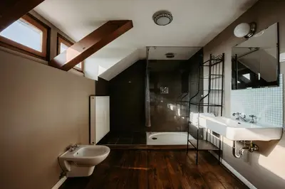 a bathroom with a sink and a toilet and a shower at Hisa Vina in Podlehnik