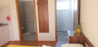 a bathroom with a shower and a toilet and a sink at Relax in Črni Kal in Črni Kal