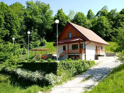 a small building in the middle of a field at Valley View Holiday Home with Sauna Mrak in Slappe dʼIdria
