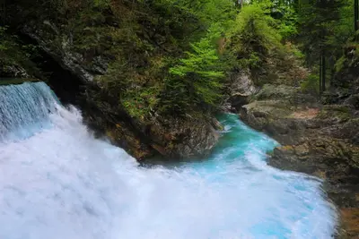 a waterfall in the middle of a river at Apartma Marjetica II. in Blejska Dobrava