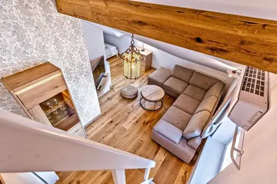 an overhead view of a living room with a couch at Apartments Koledniki in Bled
