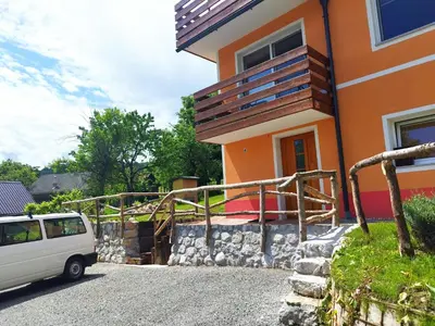 a van parked in front of a house at Two Angels in Bled