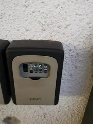 a soap dispenser on the side of a wall at Krasen Kras Apartment in Komen