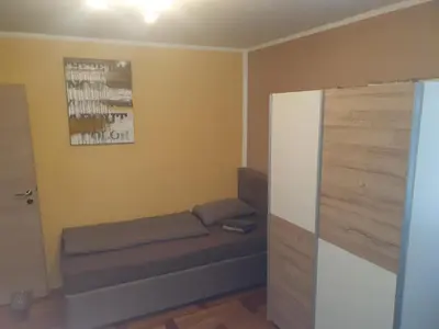 a small room with a dog bed in the corner at Sanja apartment near to Ljubljana in Preserje pri Radomljah