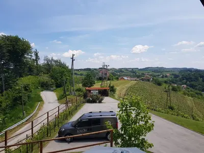a limousine parked on the side of a road at Wine House Kaloh in Maribor