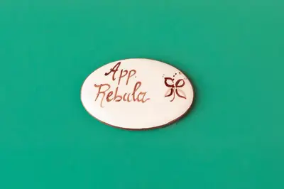 a white button with a sign that says riprolilli at Guest House Valentincic in Nova Gorica