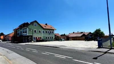 a street with houses on the side of a road at Hostel Sonce in Ptuj