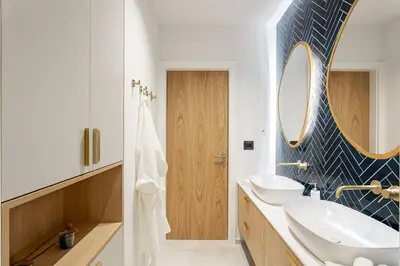 a bathroom with a sink and a mirror at Apartment Zoja in Kranjska Gora