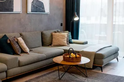 a living room with a couch and a table at Apartment Zoja in Kranjska Gora
