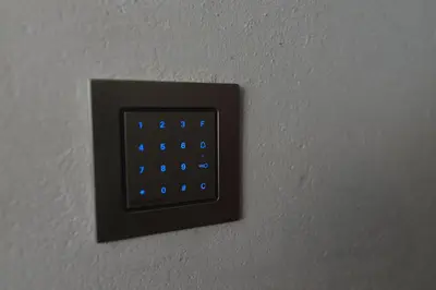 a lightswitch with blue lights on a wall at RIVER SIDE CENTRAL MARKET - Eclipse superior apartment in Ljubljana