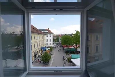 a view from a window of a city street at RIVER SIDE CENTRAL MARKET - Eclipse superior apartment in Ljubljana