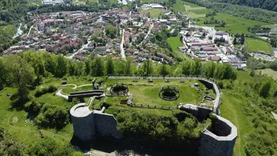 an aerial view of an old castle in a park at Apartment and room Anica in Tolmin