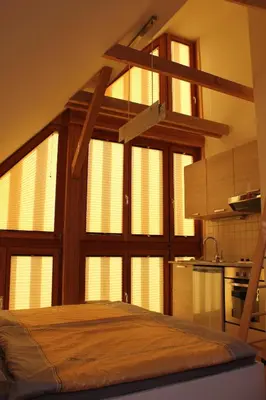 a large window in a room with a kitchen at Guest accomodation Klancar in Ig
