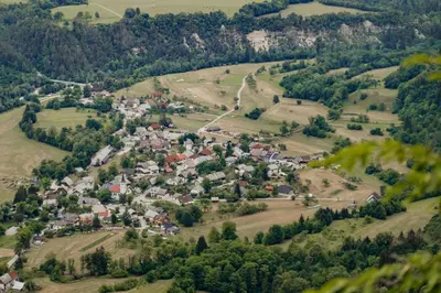 an aerial view of a small town on a hill at Apartma Jernej in Bovec