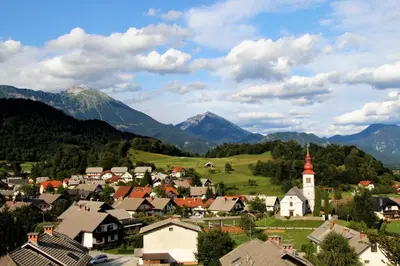 a small town in a valley with mountains in the background at 238 Spodnje Gorje in Spodnje Gorje