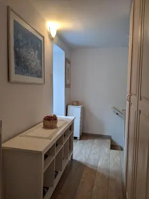 a kitchen with a island in a room at House by the Lake in Most na Soči