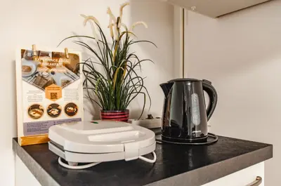 a blender sitting on top of a counter at Apartma Amelie & Studio Mimi Bled in Bled