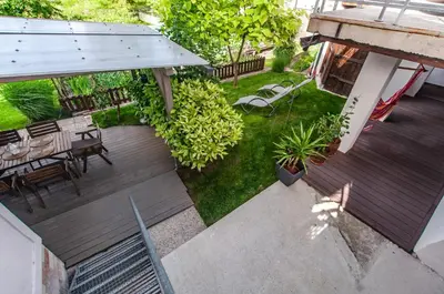 an overhead view of a backyard with a table and chairs at Apartma Amelie & Studio Mimi Bled in Bled