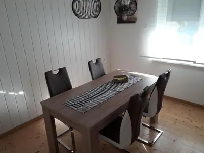 a wooden table with a keyboard on top of it at Apartments Justin in Bled