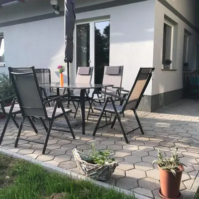 a table and chairs sitting on a patio at Apartma Peter1a in Begunje na Gorenjskem