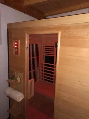 a door leading into a room with a room with a door at Apartma Fani-Kobarid in Podbela