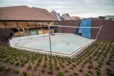 an overhead view of a building with a swimming pool at Sunny House with Sauna in Bistrica ob Sotli