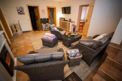 an overhead view of a living room with couches and chairs at Guest House Frata in Dvor