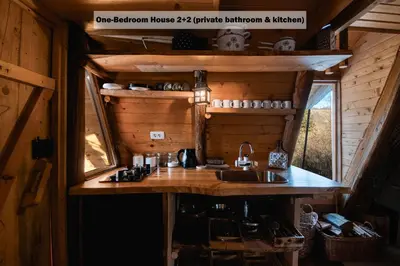 a kitchen in a tiny house with a sink at Ranch at Geta in Razgorce